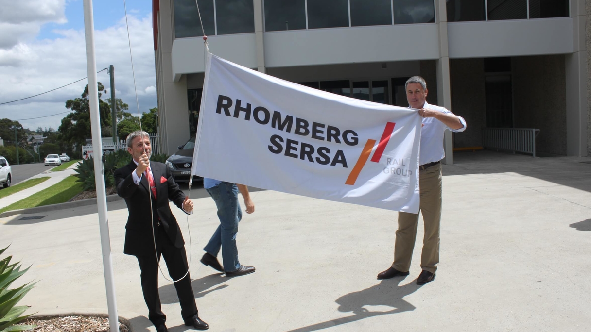 2015 Koni and Richard raise the RSRG flag in Australia.JPG
